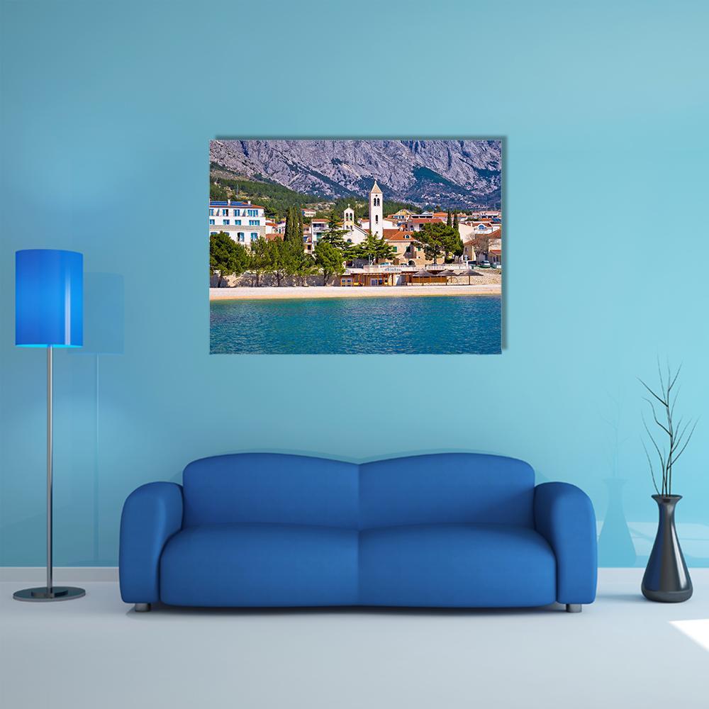 Baska Voda Sunny Coastal Town Canvas Wall Art in white, gray and blue, single panel hung on a wall