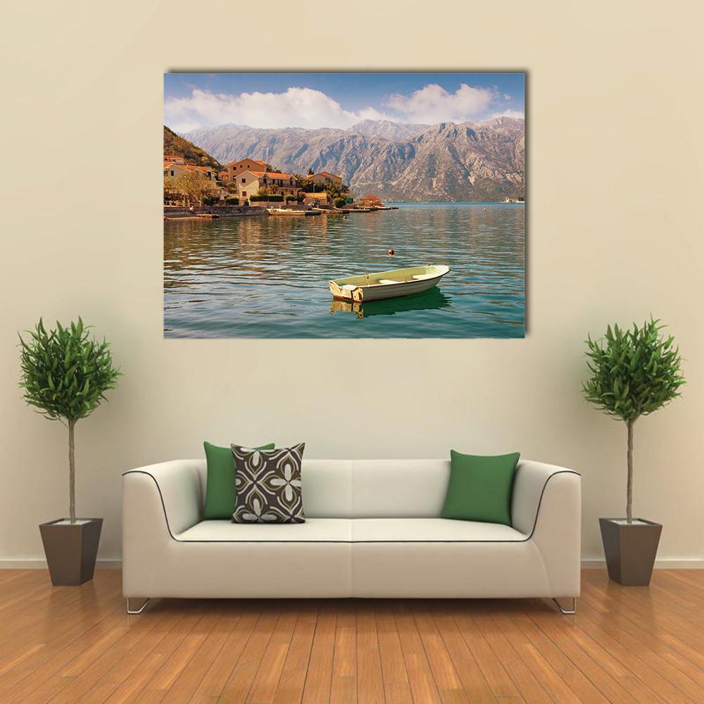 Bay of Kotor with Small White Boat Canvas Wall Art in gray, brown and blue, single panel hung on a wall