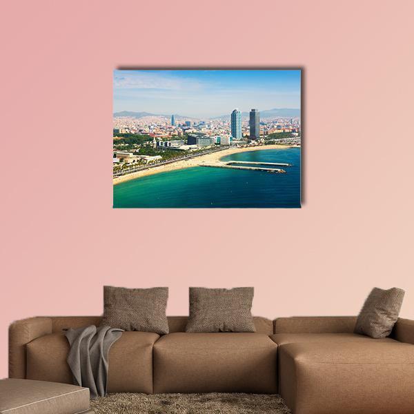 Barcelona Aerial with Beach and Twin Skyscrapers Canvas Wall Art in white, beige and blue, single panel hung on a wall