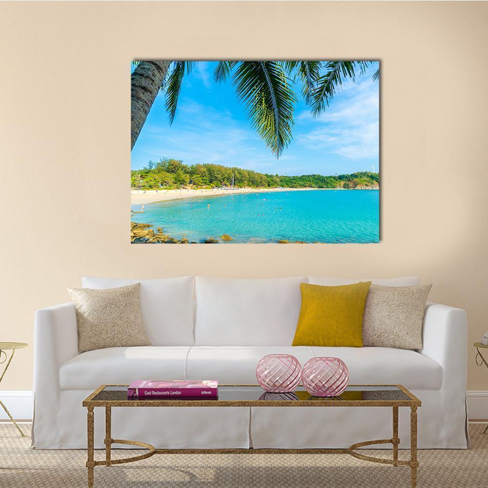 Palm Tree Paradise Island Canvas Wall Art in beige, green and blue, single panel hung on a wall