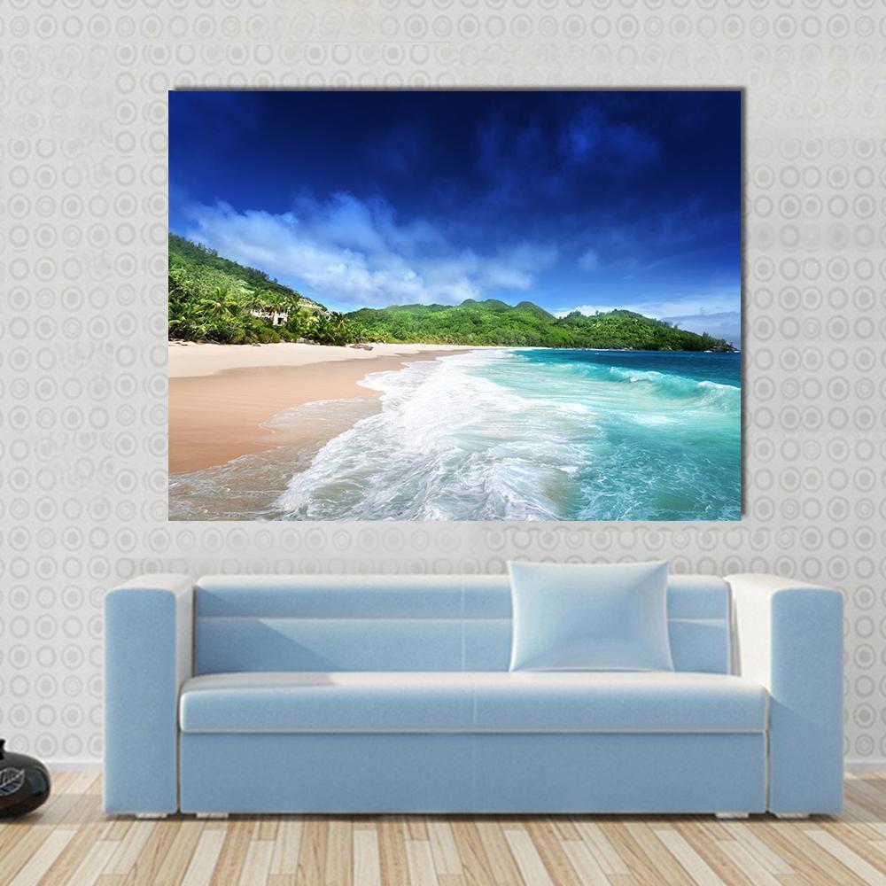 Beach at Mahe Island Seychelles Canvas Wall Art in beige, green and blue, single panel hung on a wall