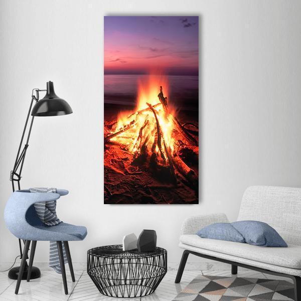 Lakeside Beach Campfire Vertical Canvas Wall Art in red, orange and purple, single vertical panel hung on a wall