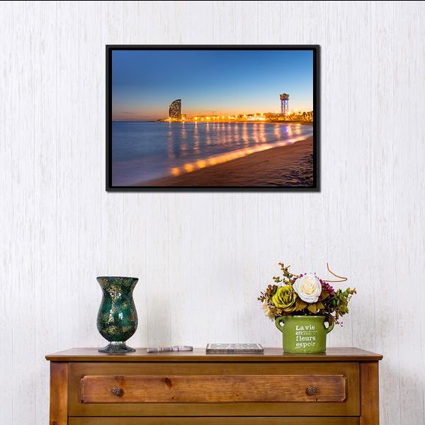 Barcelona Beach at Sunset Canvas Wall Art in orange, yellow and blue, framed canvas, product view on a white background