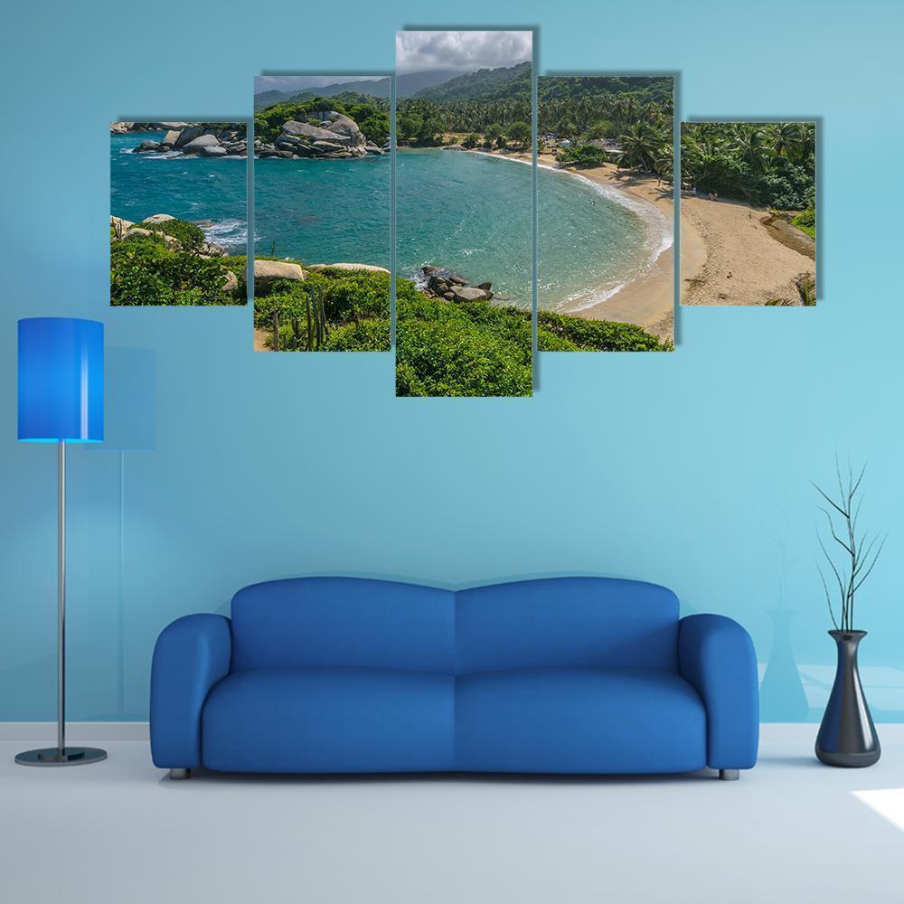 Colombian Turquoise Beach Cove Canvas Wall Art in beige, green and blue, 5 panel Star layout hung on a wall