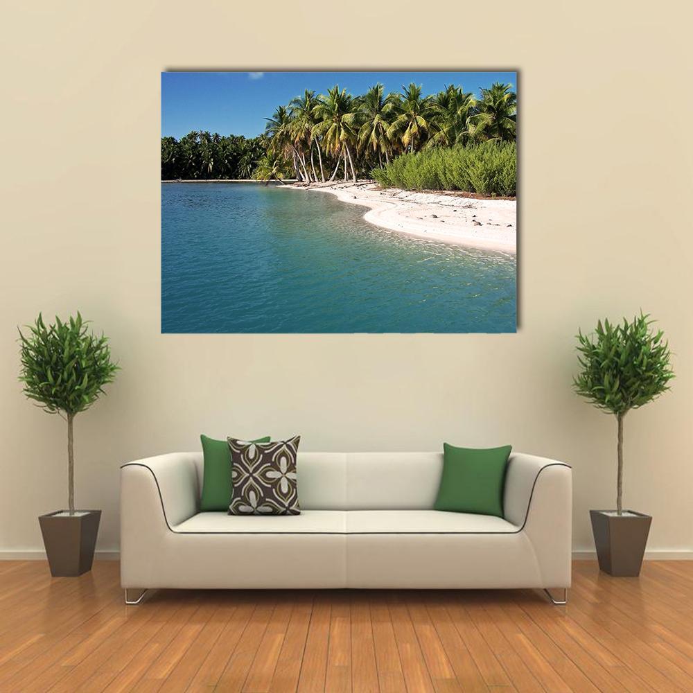Tropical Beach in Bora Bora Canvas Wall Art in white, green and blue, single panel hung on a wall