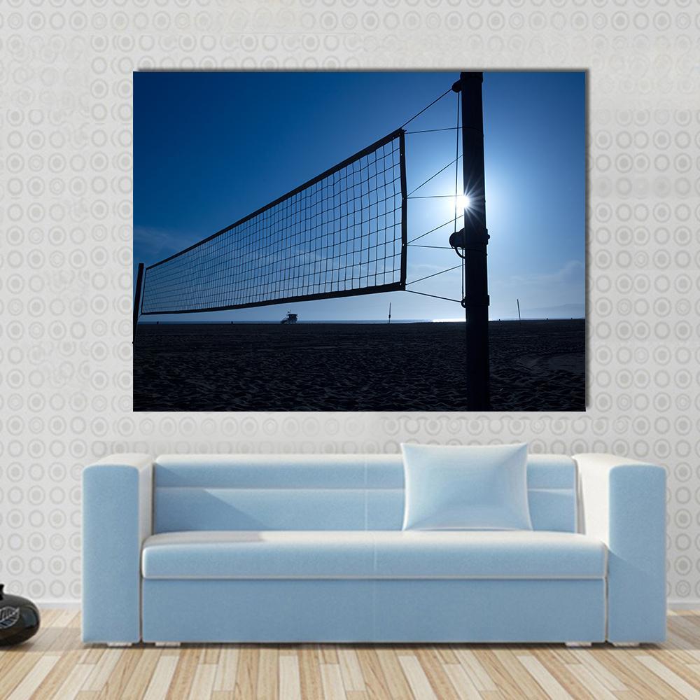 Volleyball Net on Beach Canvas Wall Art in black and blue, single panel hung on a wall