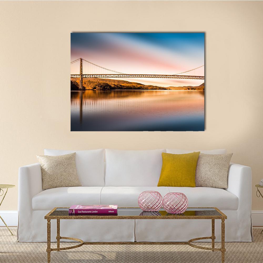 Bear Mountain Bridge at Sunset Canvas Wall Art in orange, blue and pink, single panel hung on a wall