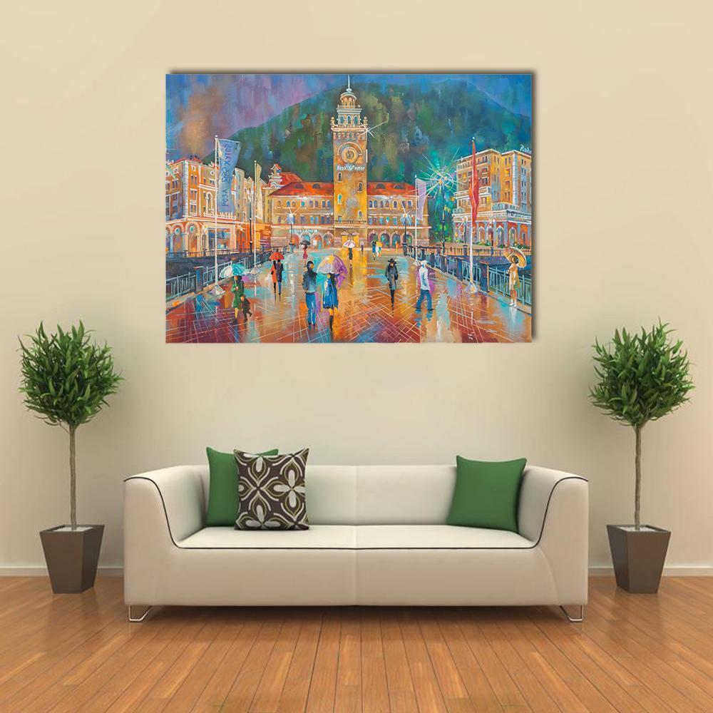 Rainy City Square with Clock Tower Canvas Wall Art in orange, yellow and blue, single panel hung on a wall