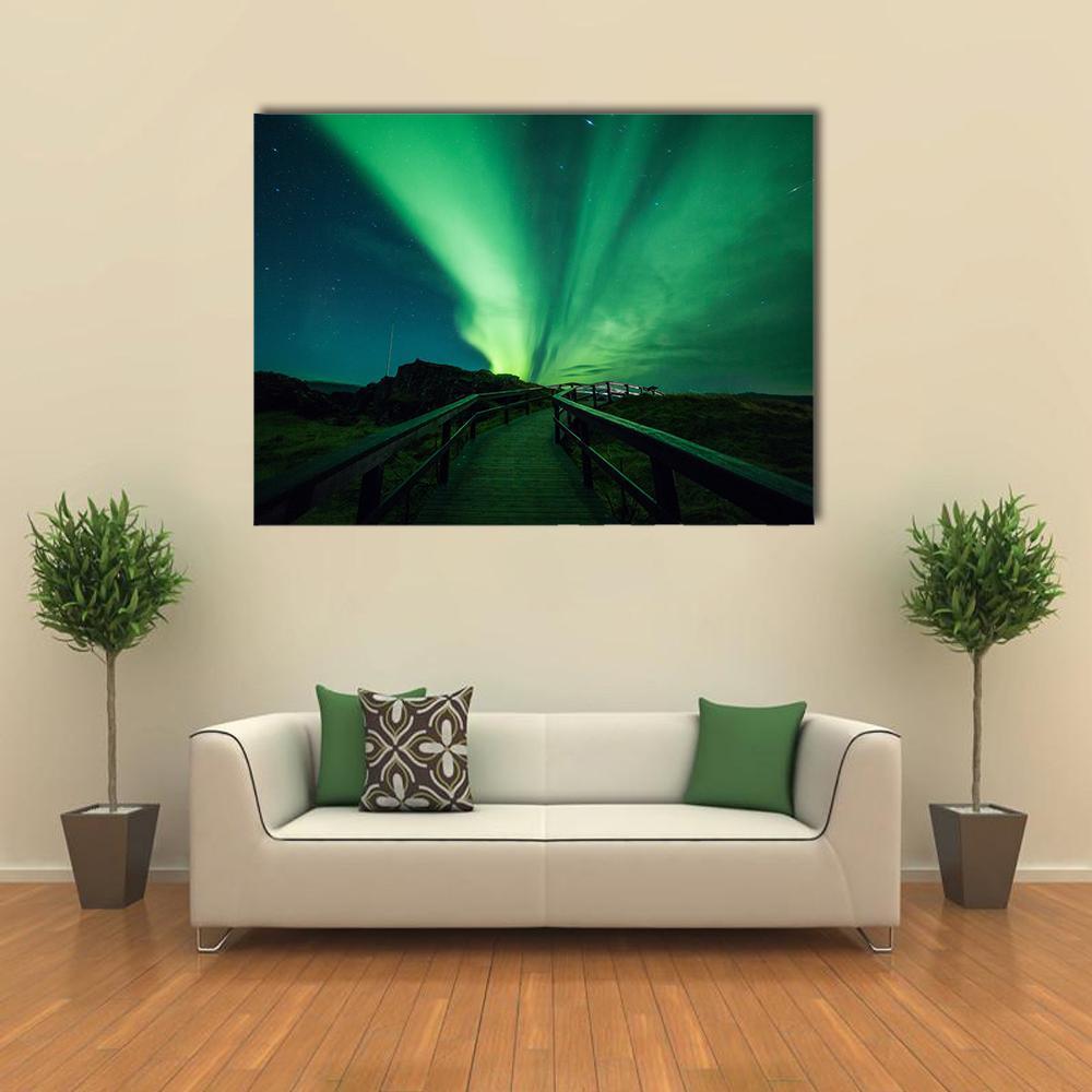 Aurora Borealis in Iceland Canvas Wall Art in black and green, single panel hung on a wall