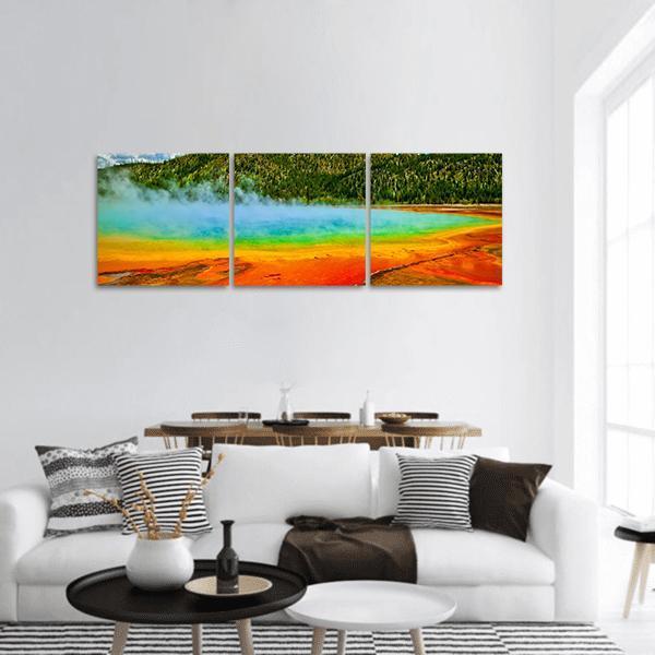Cerulean Geyser Hot Spring Panoramic Canvas Wall Art in orange, green and blue, hung on a wall