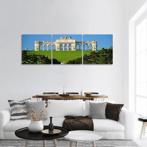 Gloriette at Schonbrunn Park, Vienna Panoramic Canvas Wall Art in beige, green and blue, hung on a wall