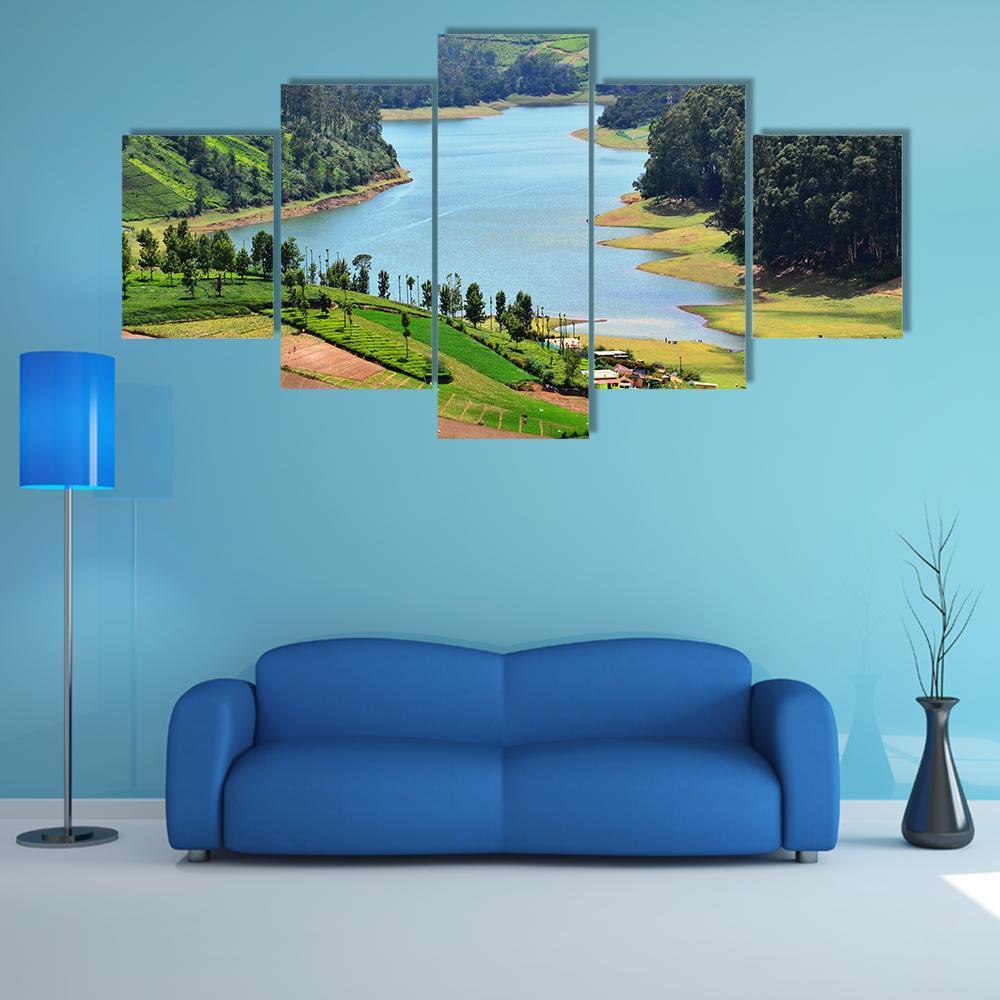 Winding River Through Terraced Fields Canvas Wall Art in brown, green and blue, 5 panel Star layout hung on a wall