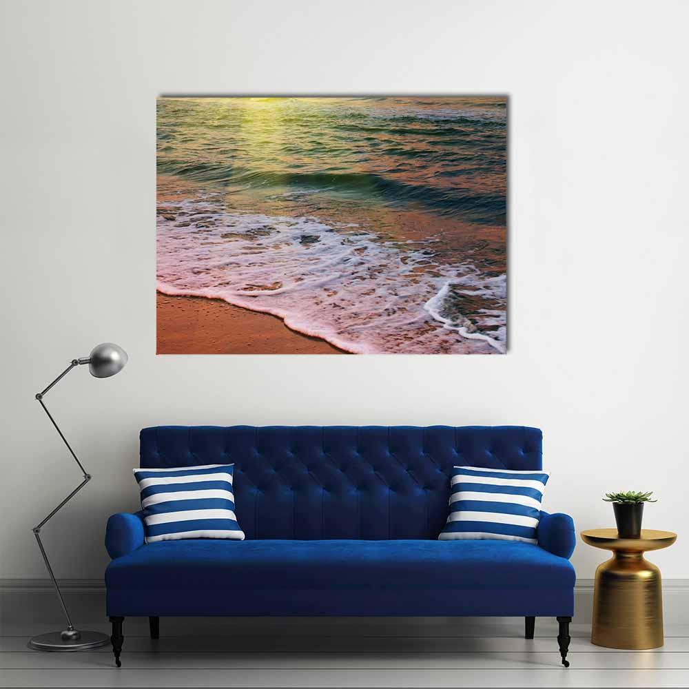 Golden Beach Sunset with Sea Foam Canvas Wall Art in gold, orange and blue, single panel hung on a wall