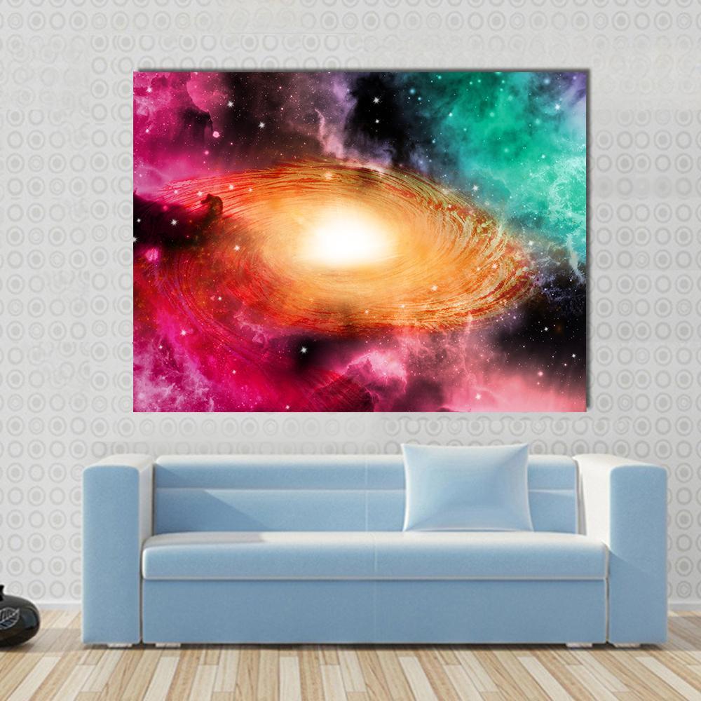 Beautiful Spiral Galaxy Canvas Wall Art in orange, pink and multicolor, single panel hung on a wall