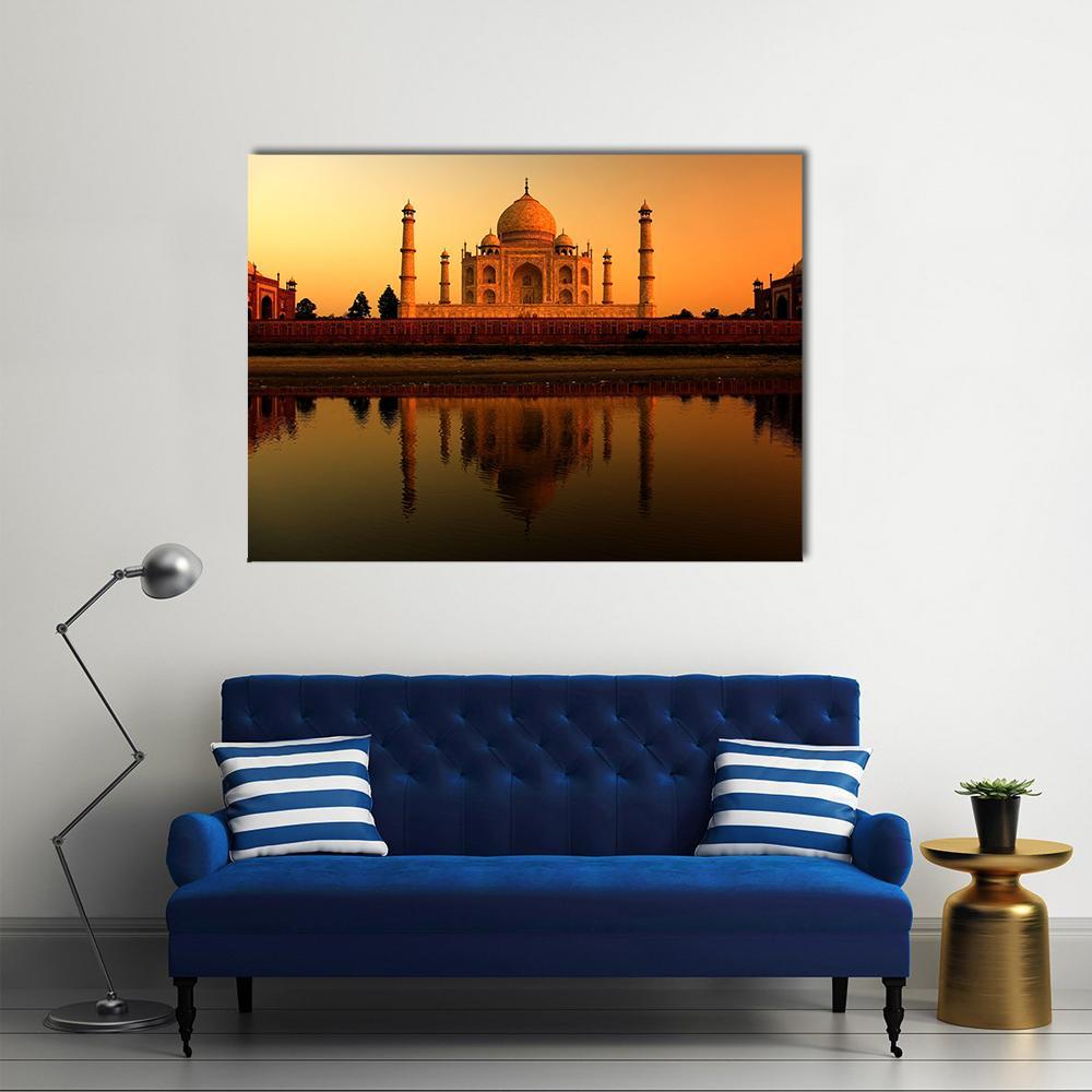 Taj Mahal at Sunset Canvas Wall Art in brown, orange and yellow, single panel hung on a wall
