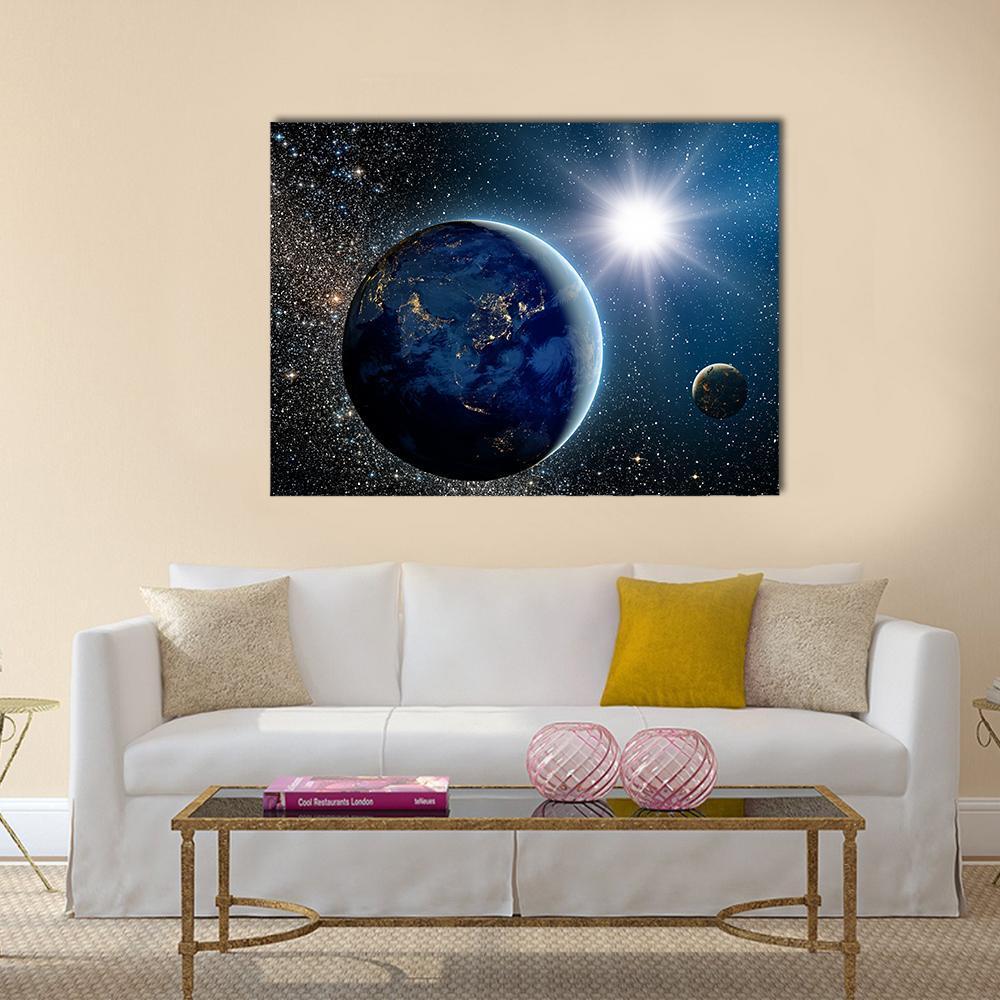 Earth with City Lights, Sun and Moon Canvas Wall Art in black and blue, single panel hung on a wall