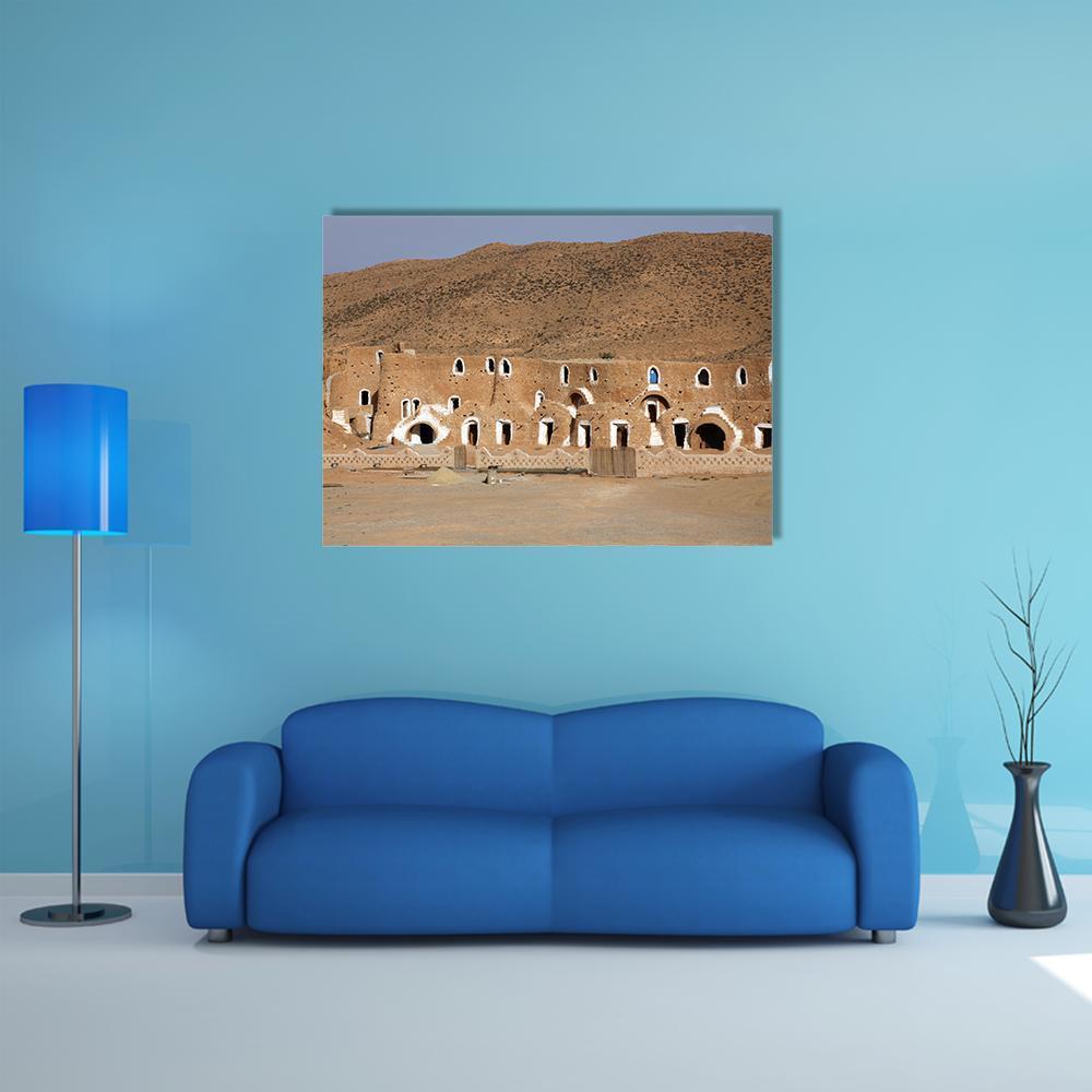 Bedouin Rock-cut Houses in Tunisia Canvas Wall Art in white, beige and brown, single panel hung on a wall