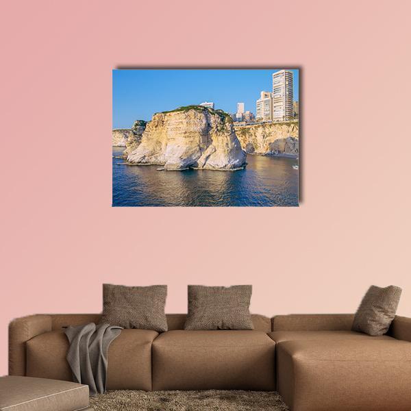 Beirut Pigeon Rocks Coastal Cliffs Canvas Wall Art in beige and blue, single panel hung on a wall