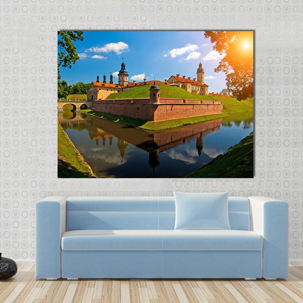 Belarus Castle with Moat Canvas Wall Art in brown, green and blue, single panel hung on a wall