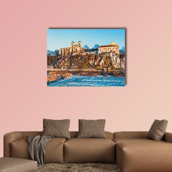Benedictine Abbey of Tyniec Canvas Wall Art in beige, brown and blue, single panel hung on a wall