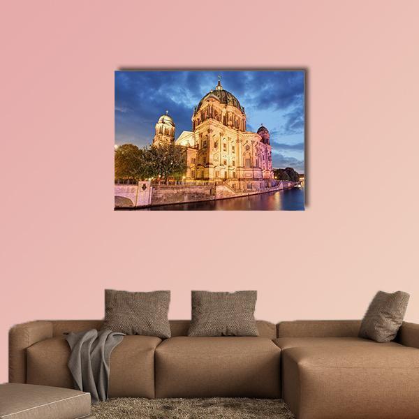 Berlin Cathedral at Night Canvas Wall Art in gold, yellow and blue, single panel hung on a wall