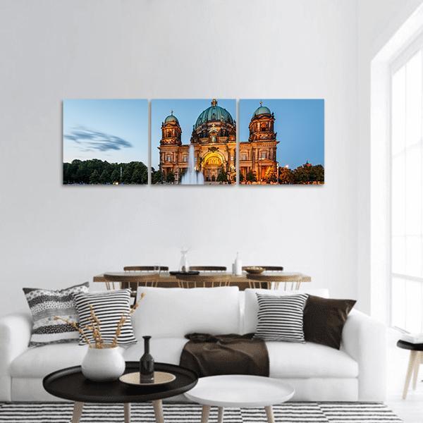 Berliner Dom and Fountain at Twilight Panoramic Canvas Wall Art in orange, yellow and blue, hung on a wall
