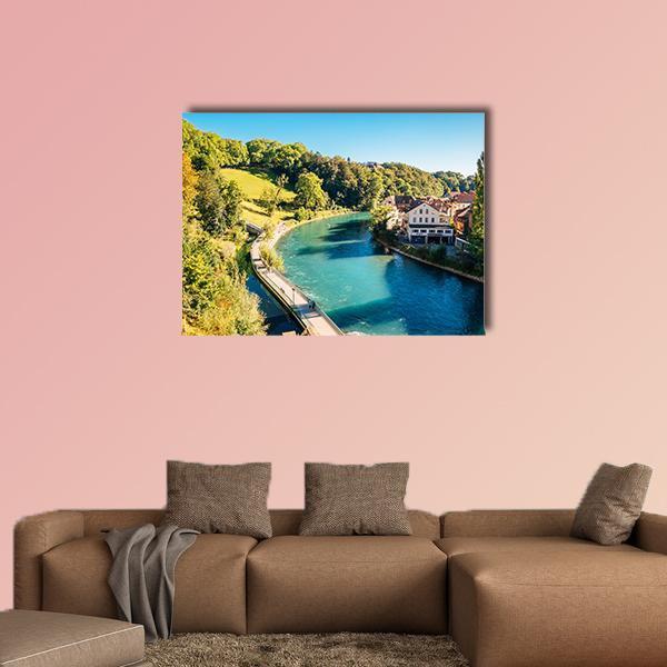 Bern Old Town River Bridge Canvas Wall Art in yellow, green and blue, single panel hung on a wall