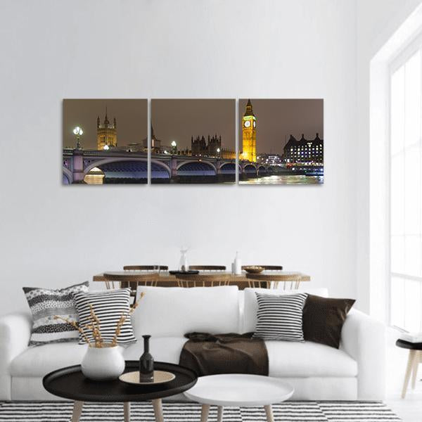 Big Ben at Night, London Panoramic Canvas Wall Art in black, gold and yellow, hung on a wall