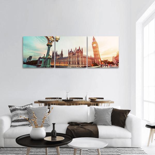 Big Ben at Sunset Panoramic Canvas Wall Art in orange, yellow and blue, hung on a wall