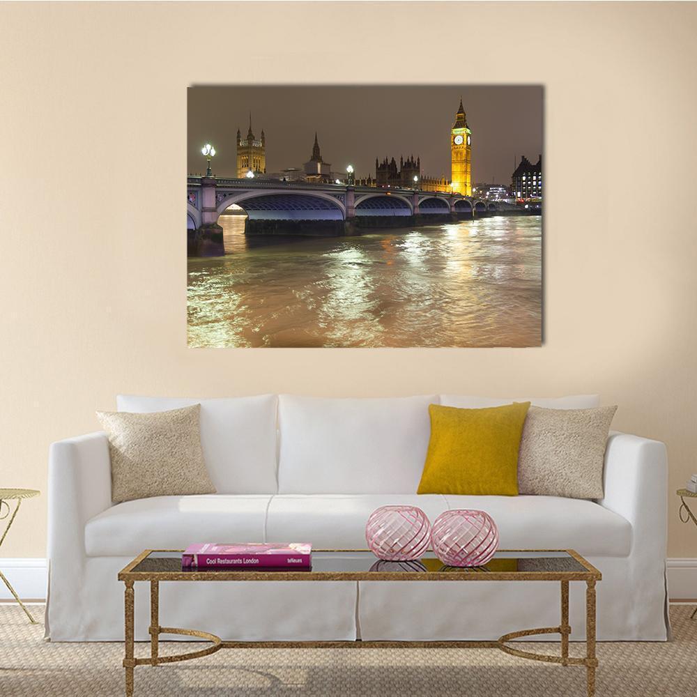 Big Ben and Westminster Bridge at Night Canvas Wall Art in gray, brown and yellow, single panel hung on a wall