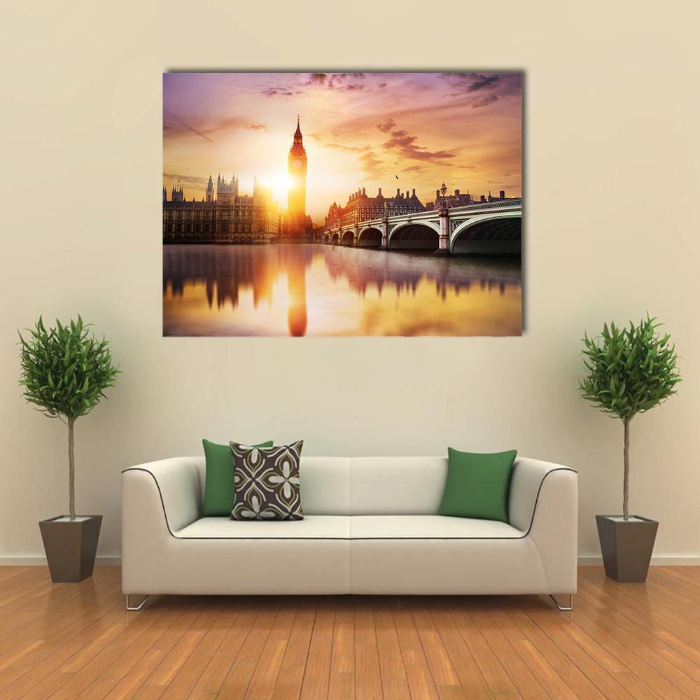 Big Ben at Sunset Canvas Wall Art in orange, yellow and purple, single panel hung on a wall