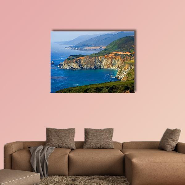 Big Sur Coast and Bixby Creek Bridge Canvas Wall Art in brown, green and blue, single panel hung on a wall