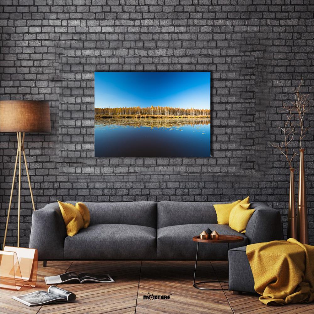 Birch Forest and Lake Canvas Wall Art in orange, yellow and blue, single panel hung on a wall