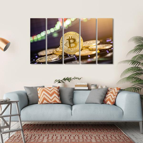 Bitcoin Gold Coin Close-up Canvas Wall Art in black, gold and yellow, single panel hung on a wall