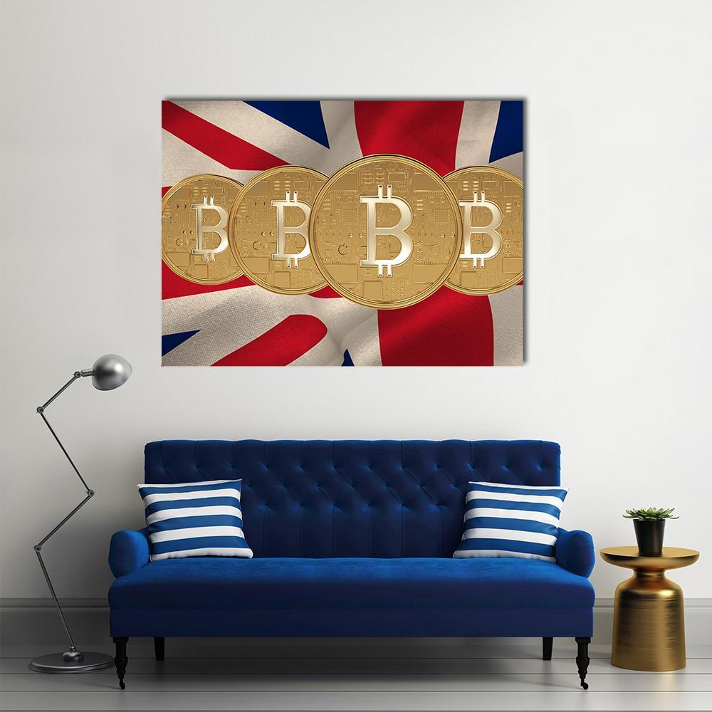 Four Gold Bitcoin Coins on Union Jack Canvas Wall Art in gold, red and blue, single panel hung on a wall