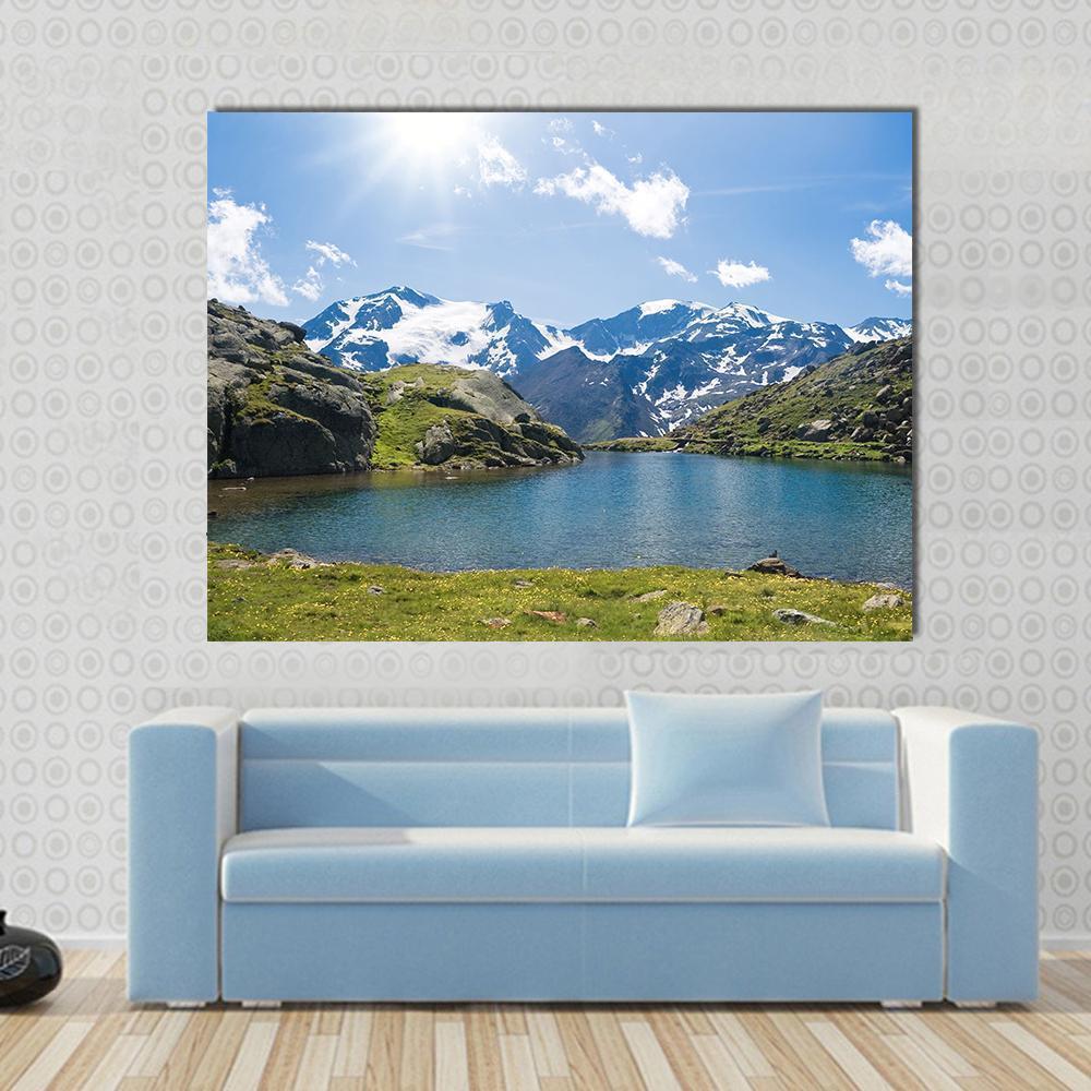 Black Lake Italy Canvas Wall Art in white, green and blue, single panel hung on a wall