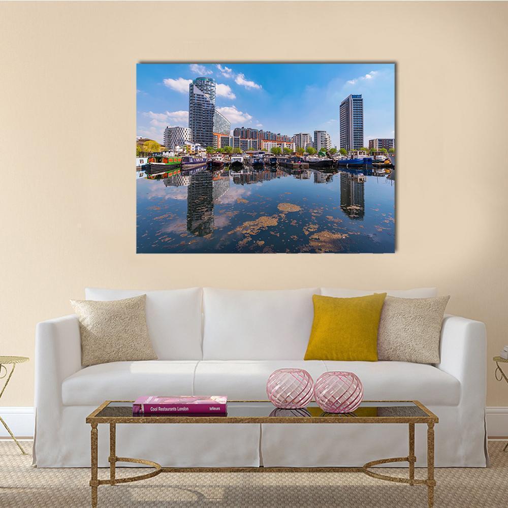 Blackwall Basin Riverside Canvas Wall Art in gray and blue, single panel hung on a wall
