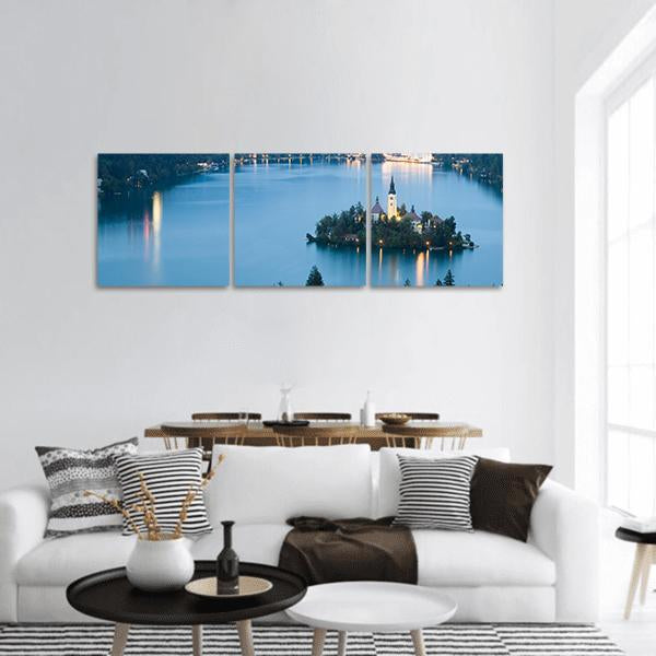 Lake Bled Island Church at Dusk Panoramic Canvas Wall Art in blue, hung on a wall