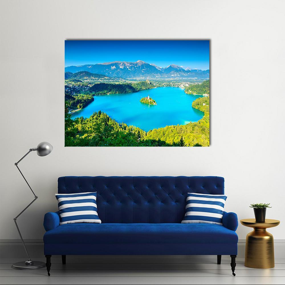 Lake Bled Island Church and Julian Alps Canvas Wall Art in green and blue, single panel hung on a wall