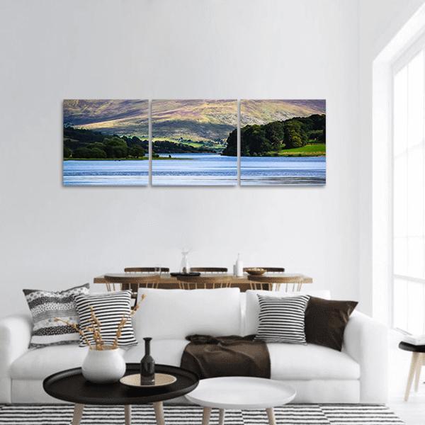 Blessington Lake Ireland Landscape Panoramic Canvas Wall Art in brown, green and blue, hung on a wall