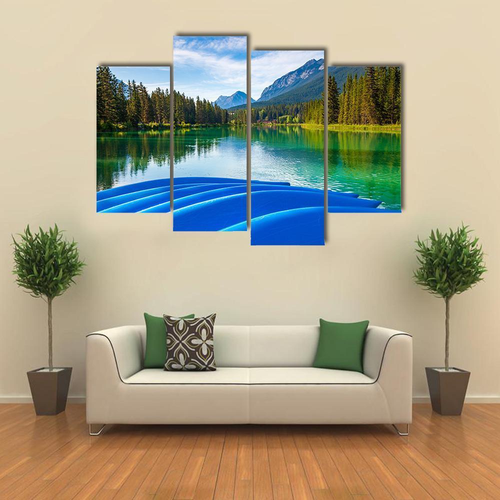 Blue Canoes On Bow River Canvas Wall Art-4 Pop-Gallery Wrap-50" x 32"-Tiaracle