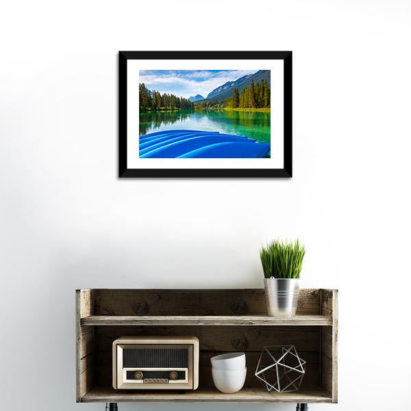 Blue Canoes On Bow River Canvas Wall Art-1 Piece-Framed Print-20" x 16"-Tiaracle