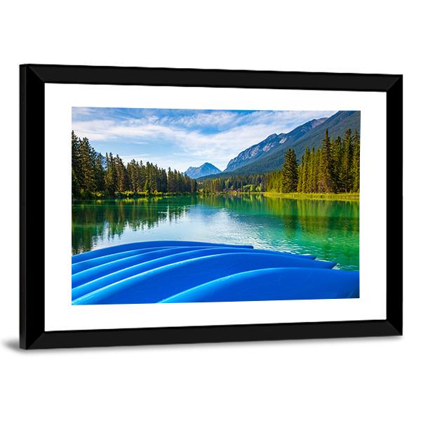 Blue Canoes On Bow River Canvas Wall Art-3 Horizontal-Gallery Wrap-25" x 16"-Tiaracle