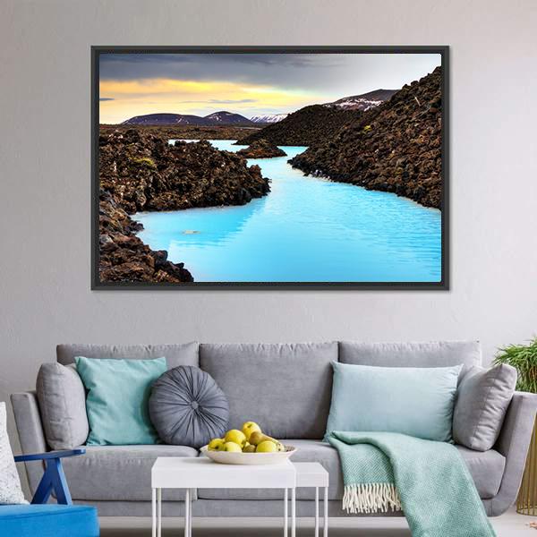 Blue Lagoon in Lava Field Canvas Wall Art in black, brown and blue, framed canvas, product view on a white background