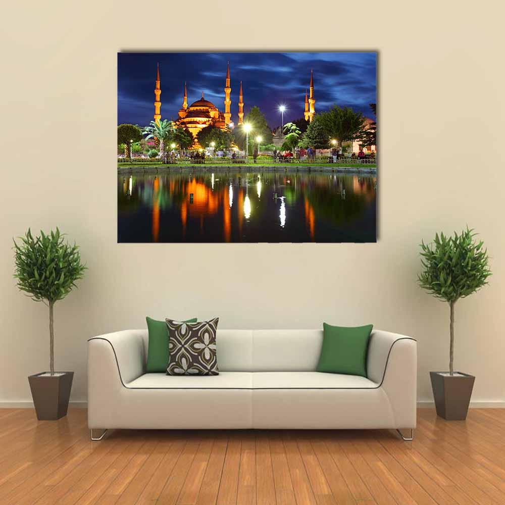 Blue Mosque at Night Canvas Wall Art in black, gold and blue, single panel hung on a wall