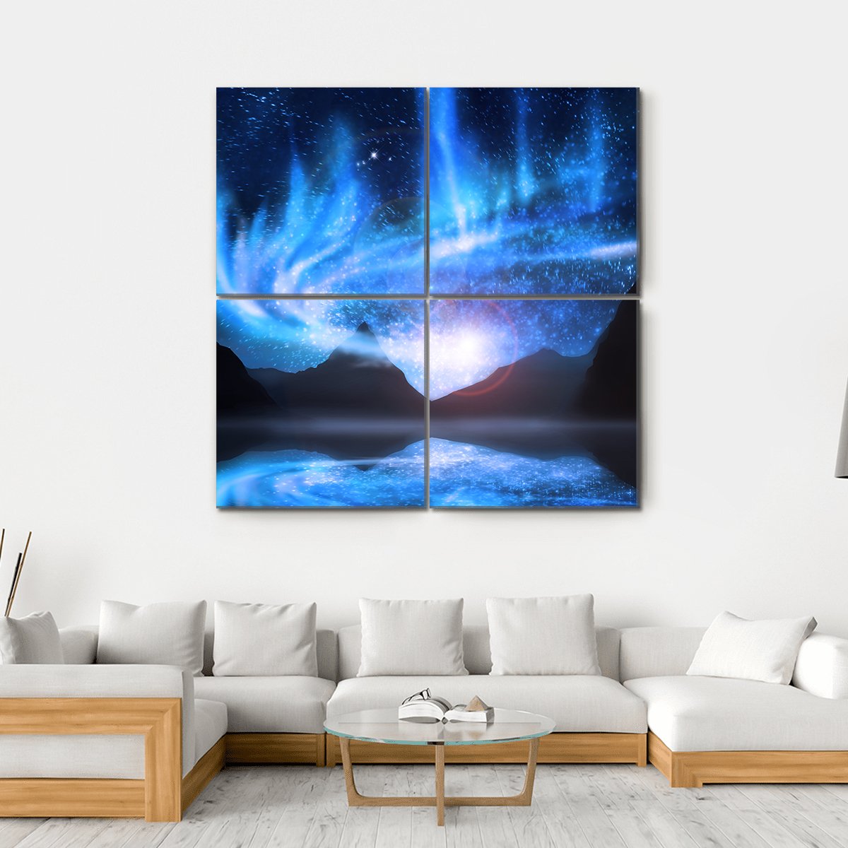 Blue Northern Lights Over Mountains Canvas Wall Art in black and blue, hung on a wall