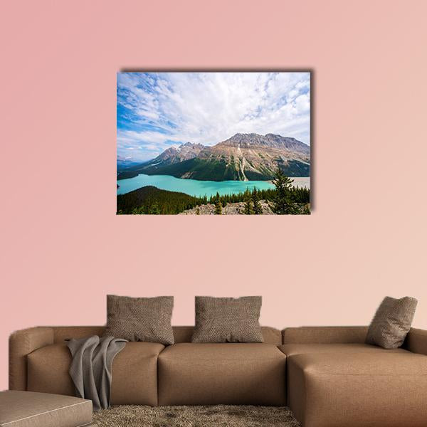 Peyto Lake Turquoise Landscape Canvas Wall Art in white, green and blue, single panel hung on a wall