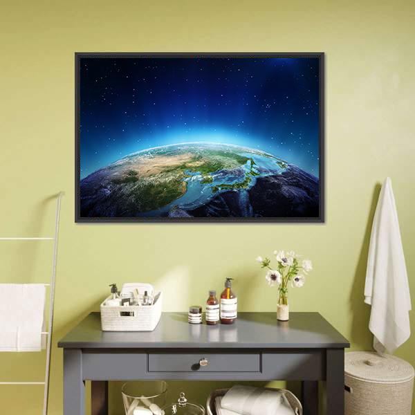 Blue Planet Earth from Space Canvas Wall Art in black and blue, framed canvas, product view on a white background