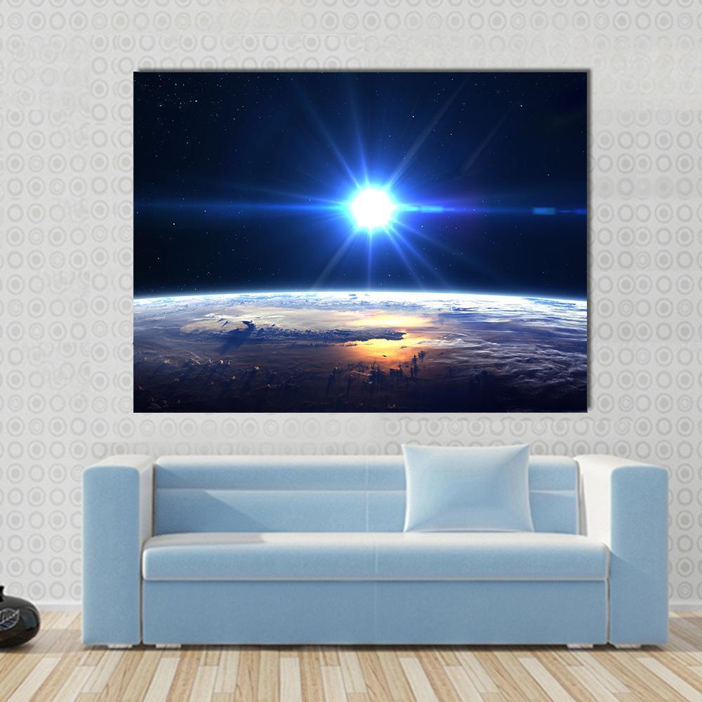 Blue Sun Light Over Planet Earth Canvas Wall Art in black, white and blue, single panel hung on a wall