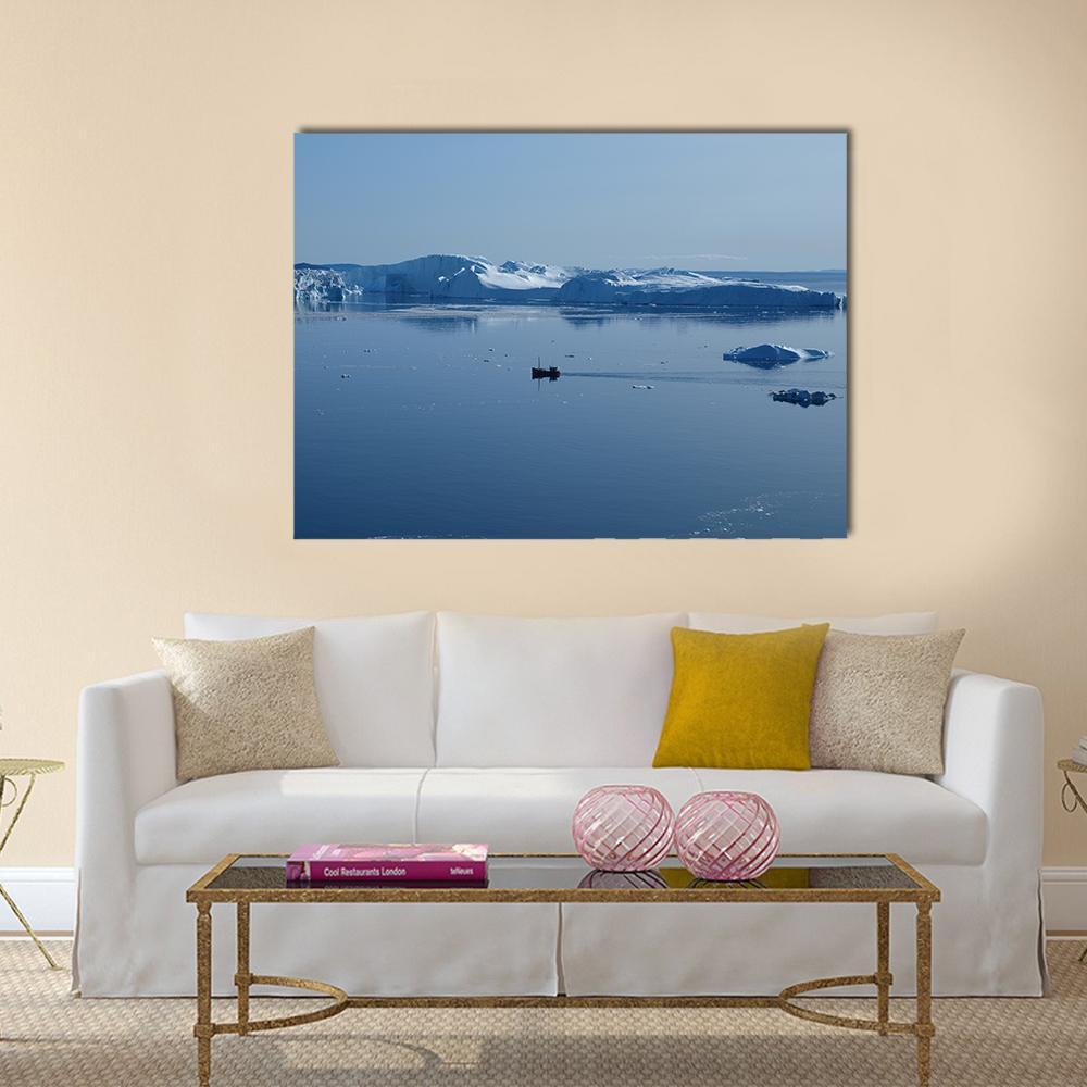 Boat in Ilulissat Icefjord Canvas Wall Art in white and blue, single panel hung on a wall